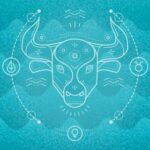 The symbol for Taurus, a bull's head, over a blue background
