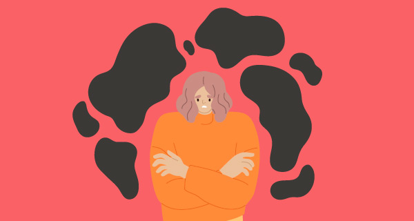 An image of a girl in an orange sweater. She has her arms crossed over her chest and threatening black clouds surround her.