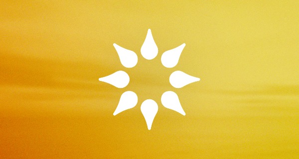 An image of the California Psychics logo, similar to the outline of a lotus from above, over a bright yellow background.