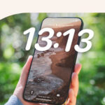 A phone with the time 13:13 on the home screen.