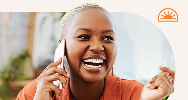 A woman getting a psychic reading over the phone.